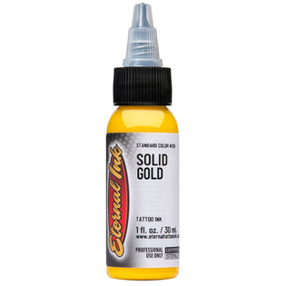 The Vegan Solid Gold Tattoo Ink by Eternal Ink in front of a solid gold branded product background.